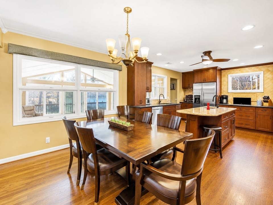 Open dining & kitchen area, window looks into the pool room