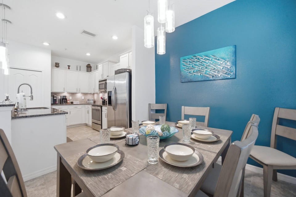 Enjoy meals together at the dining table just steps from the kitchen.  Seating for 8