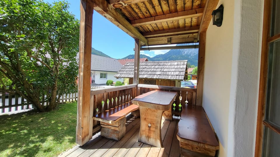 Terrace with seating and a view of the mountains
