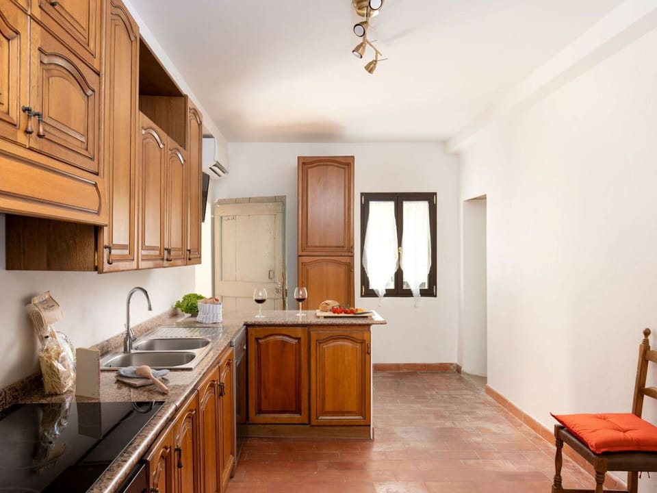 Furniture, Cabinetry, Wood, Interior Design, Flooring, Countertop, Kitchen, Floor, Room, Cupboard