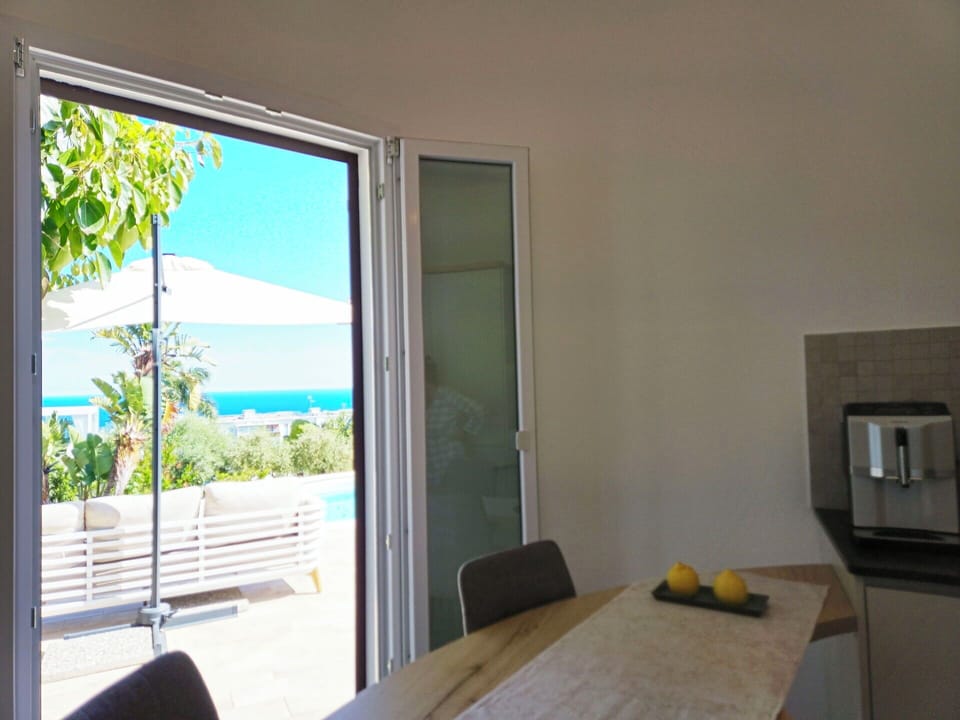 Furniture, Chair, Sea, Kitchen & Dining Room Table, Shade, Glass, Ocean, Outdoor Furniture, Wood Stain, Hardwood