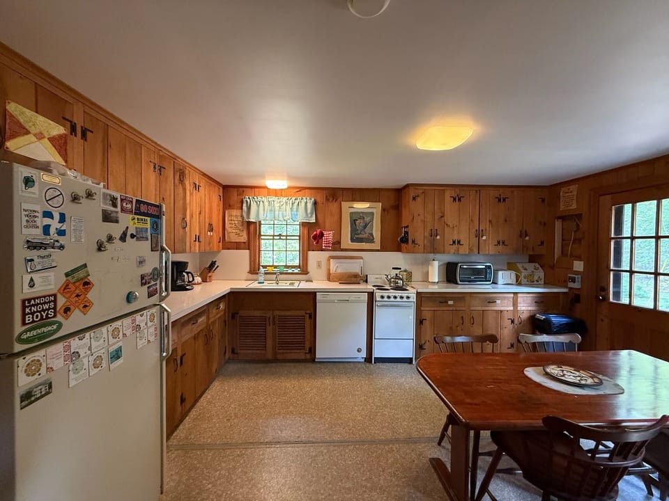 West Cove Cottage Kitchen, giving lake views through the cabinet