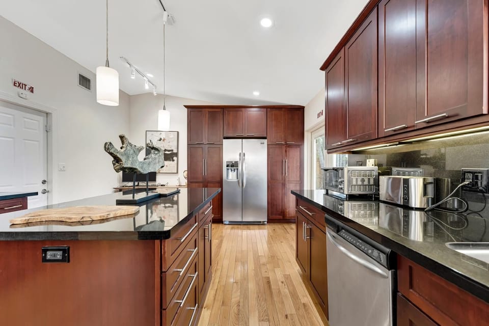 Gourmet kitchen with granite counters, stainless steel appliances
