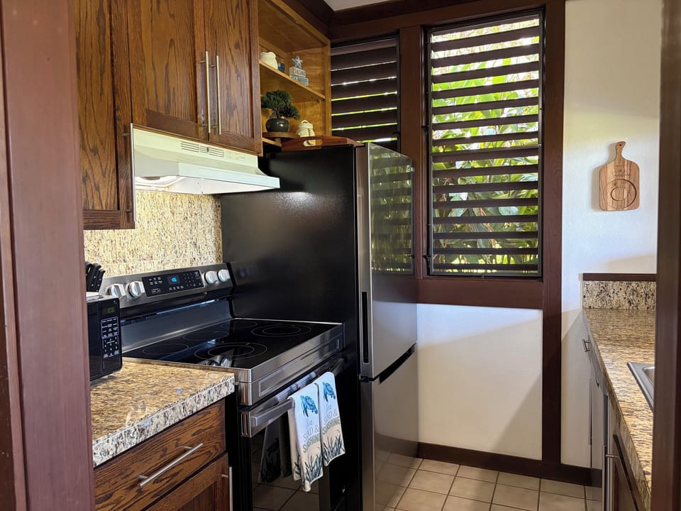 Plantation shutters allow extra light and wonderful breezes through the unit