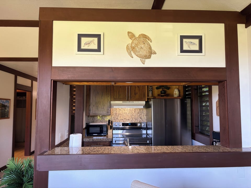 Kitchen is open to the dining area for visiting. Allows great view of outdoors
