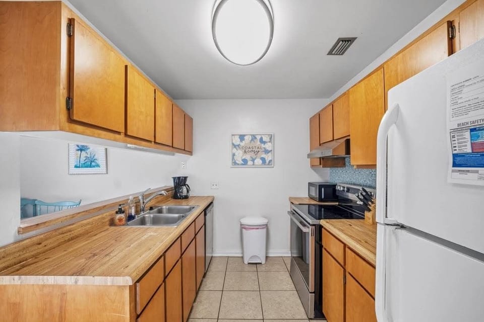 Galley kitchen with all appliances