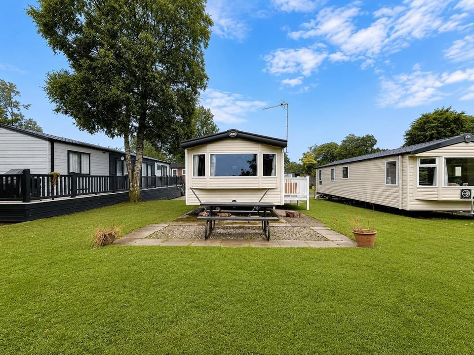 Surrounded by mature trees and open green space, it is a peaceful spot to unwind and enjoy the slower pace of holiday park