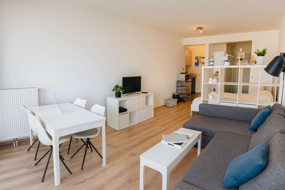 Bright and welcoming living area with modern styling. ✨ Open living:dining space with cozy seating. 🛋️