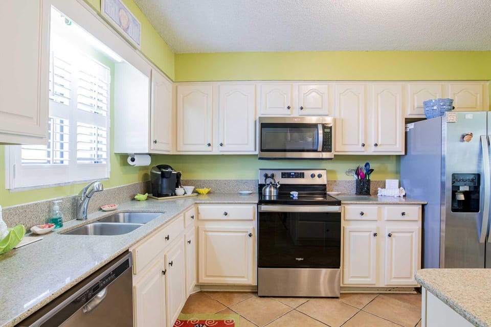 Bright, airy kitchen with modern appliances and ample storage