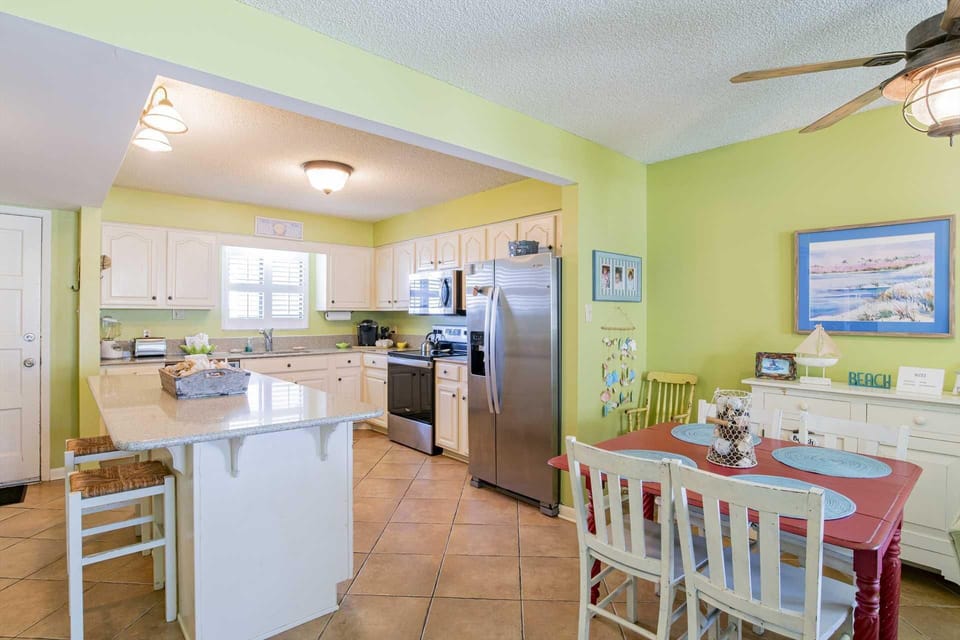 Bright, open kitchen and cozy dining nook for family meals