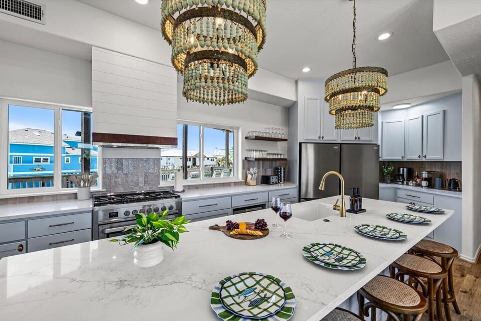 Loaded kitchen with tons of space. Meal prep while gazing at the waters just across the street. 