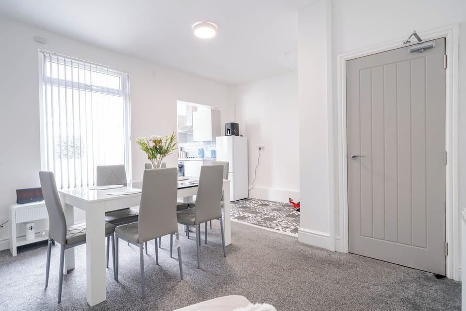 Sneak preview of dining area and kitchen