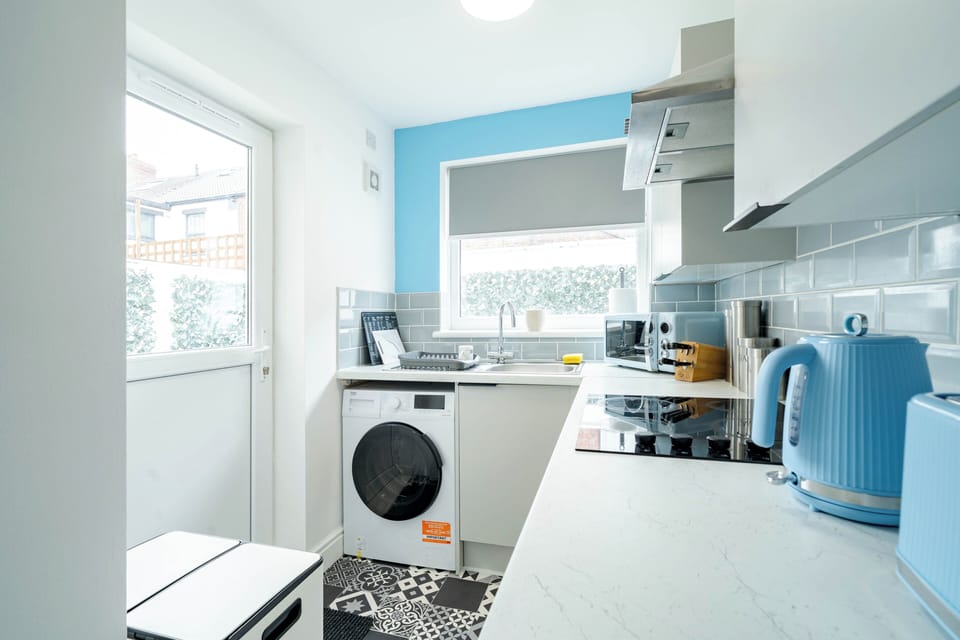 Matching colour fixtures with washing/drying in one.