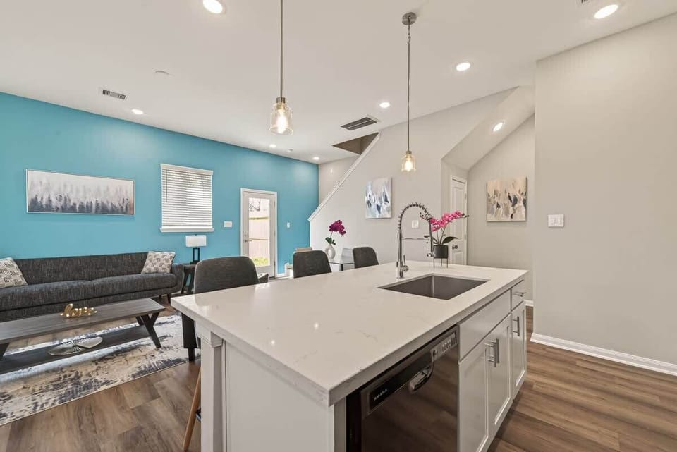 Experience seamless open-concept living with a vibrant living area and a chef-ready kitchen, perfect for socializing while you cook.