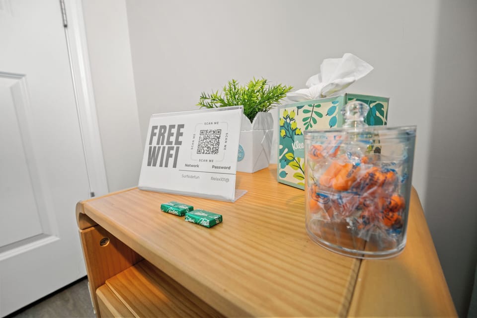 WiFi info, snacks, and tissues waiting in every bedroom