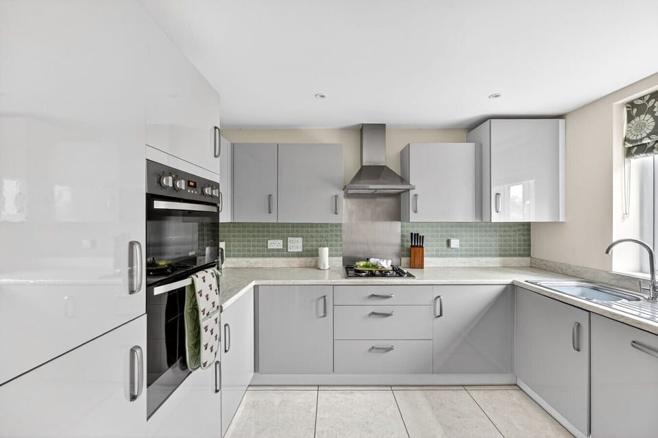 A modern fully equipped kitchen with everything you need to prepare a home cooked meal.