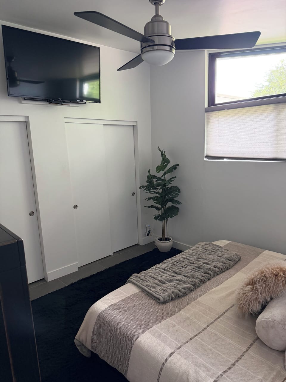 Master bedroom with retractable TV