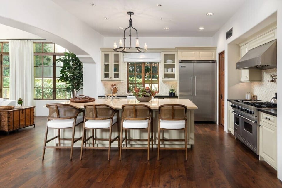 Featuring a large island, top-of-the-line appliances, and every essential thoughtfully stocked, it offers the beauty, functionality, and elevated comfort expected from a truly luxury stay.