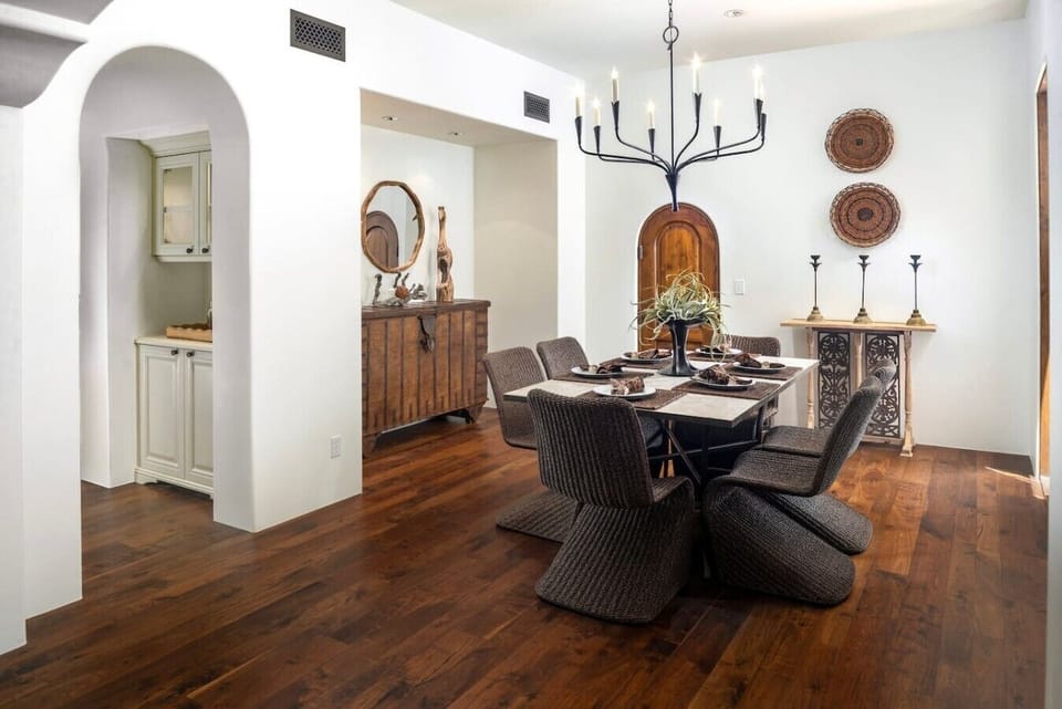 Sophisticated yet welcoming, the dining room captures the relaxed elegance of a private Mediterranean villa.
