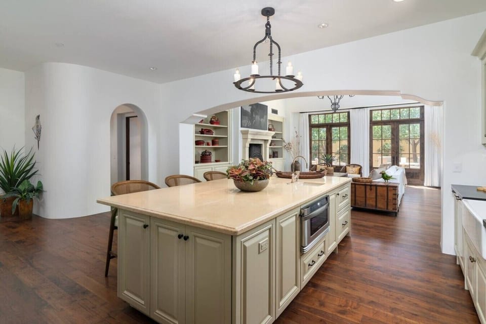 Whether preparing a leisurely breakfast before heading to the resort or sharing wine and appetizers around the oversized island, this beautifully appointed kitchen was designed to bring people together.