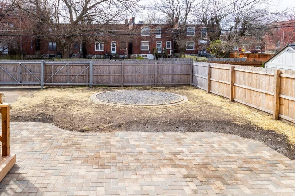 Beautifully paved and fully fence in yard