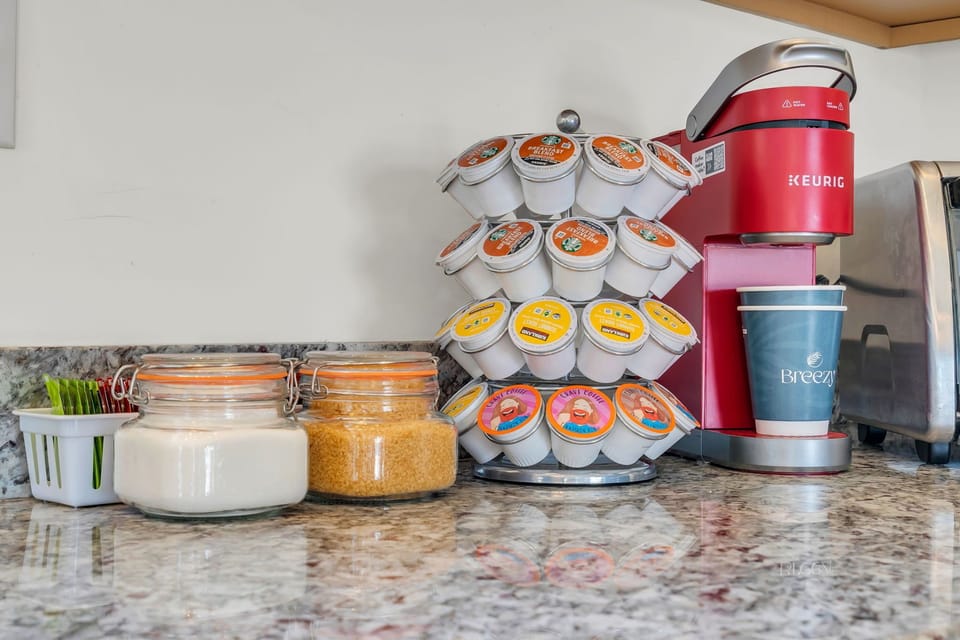Inviting coffee station with Keurig, pods, and countertop essentials