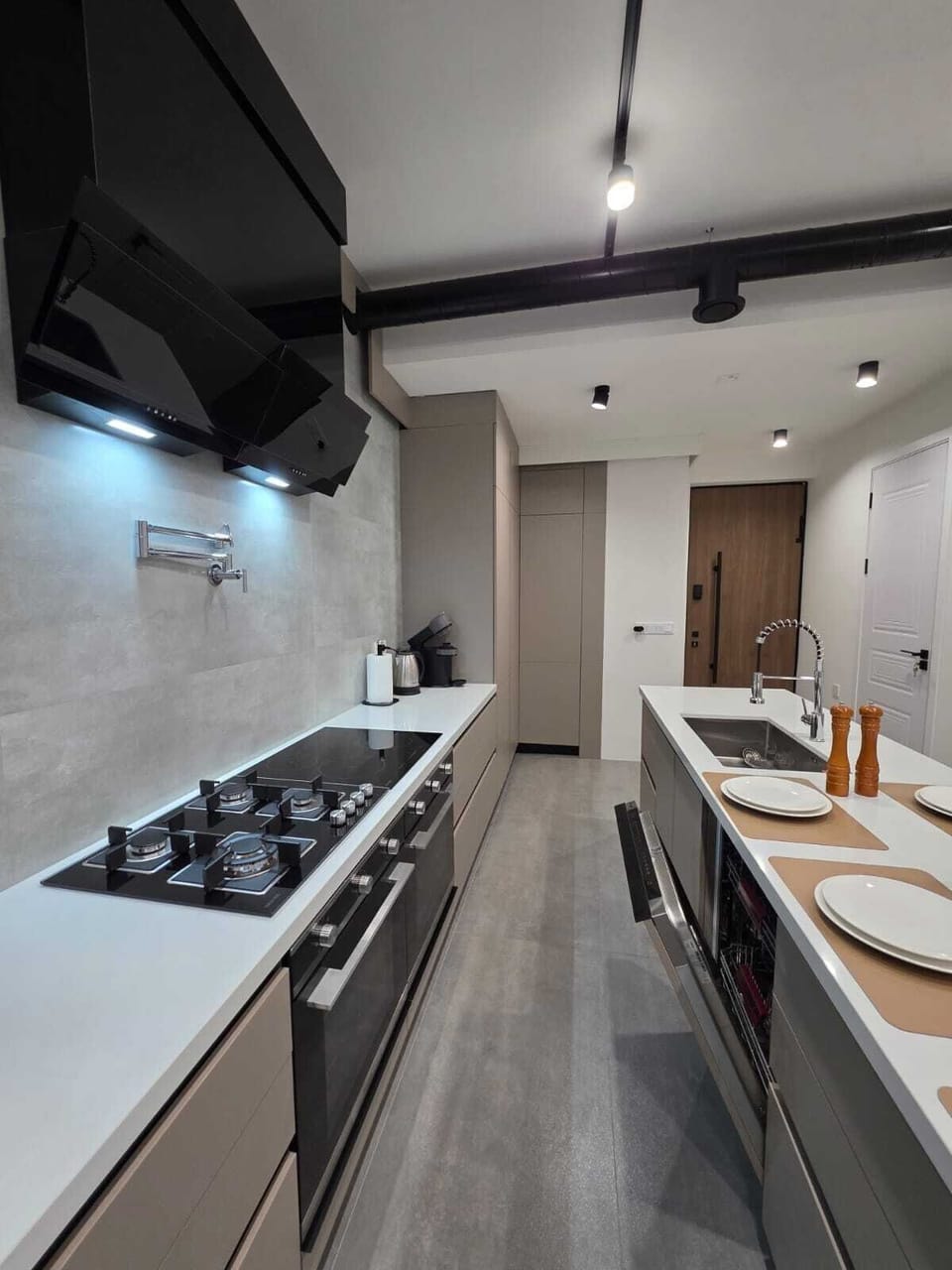 Gourmet kitchen · 8-burner range · pot filler · double fridge · wine cooler
