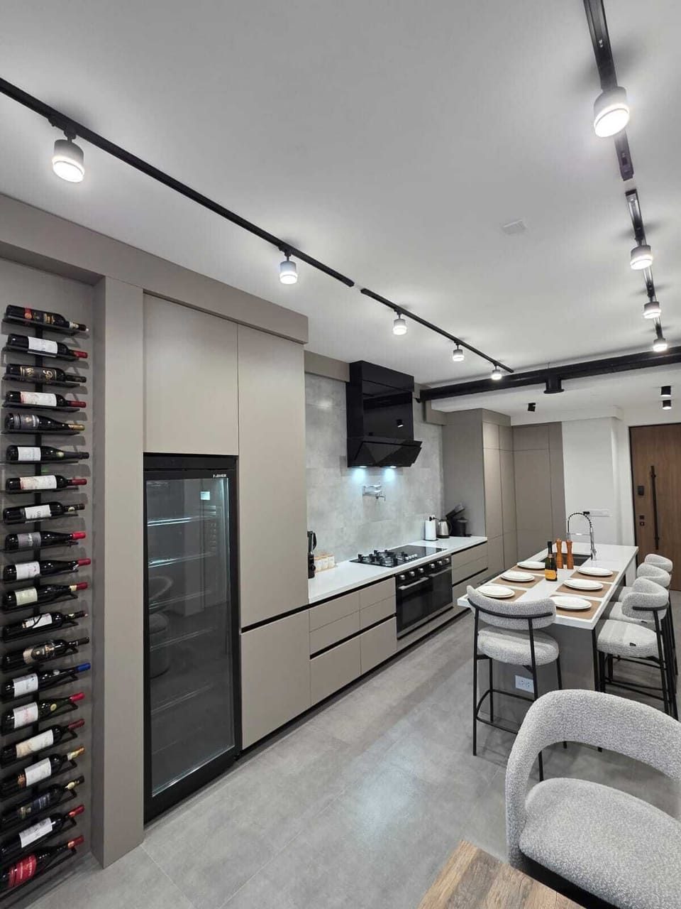 Gourmet kitchen · 8-burner range · pot filler · double fridge · wine cooler