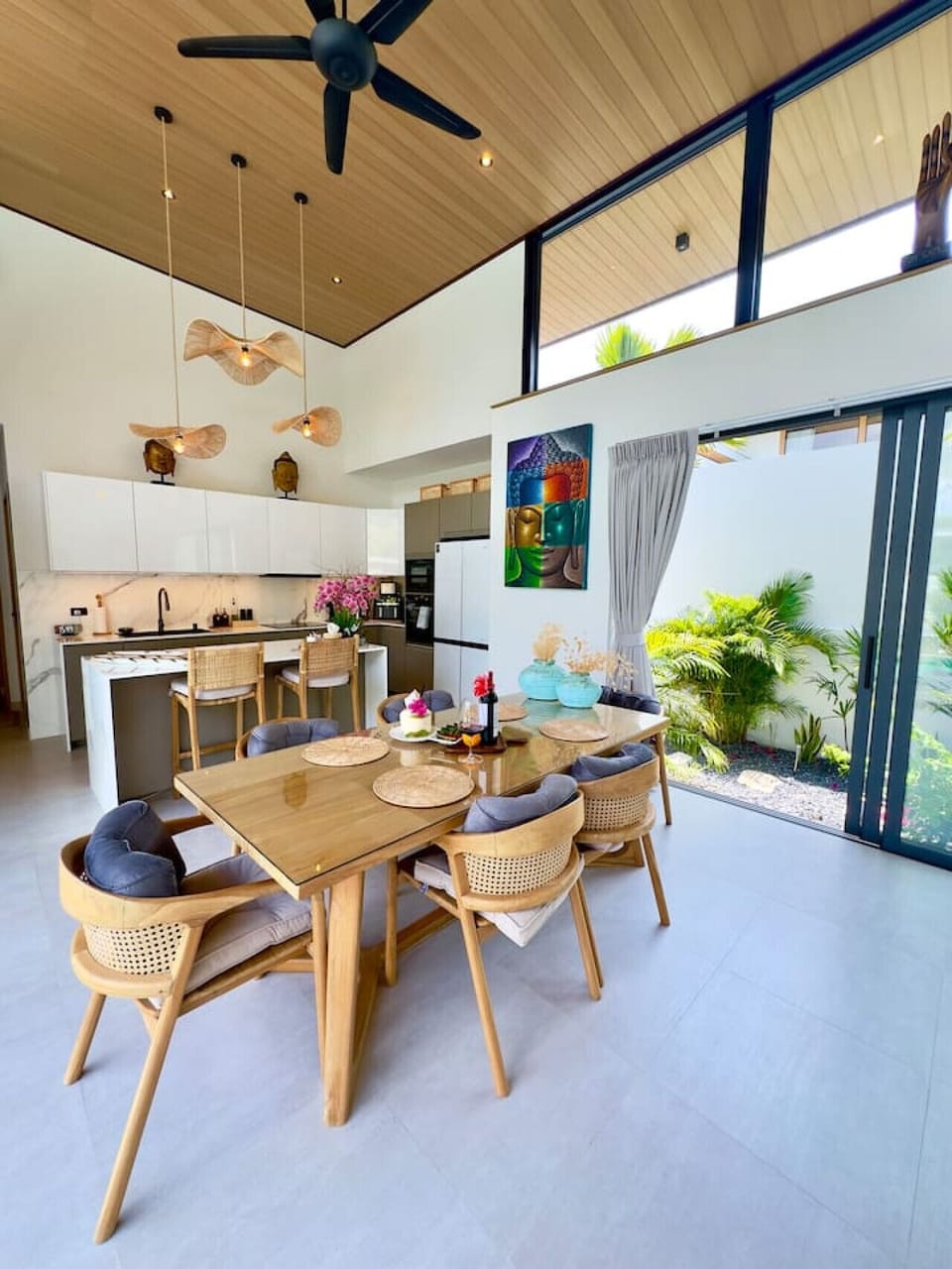 Dining area beside the kitchen with garden views – Villa Amala Koh Samui pool villa.