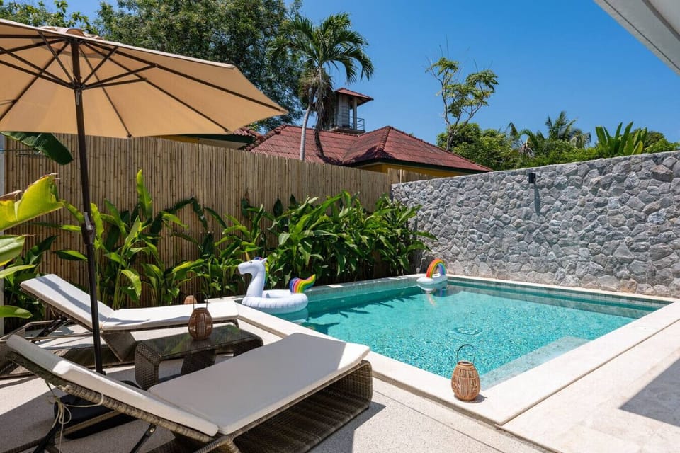 Lush tropical garden terrace with traditional Thai-inspired rooftop views