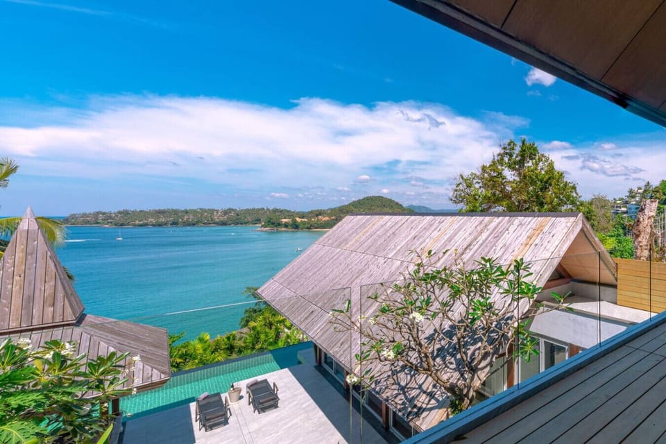 Alfresco dining area overlooking the sea at beachfront Phuket luxury villa near Surin