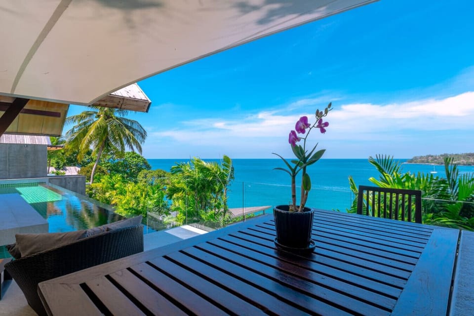 Tropical hillside setting with ocean panorama at private Surin Beach villa in Phuket