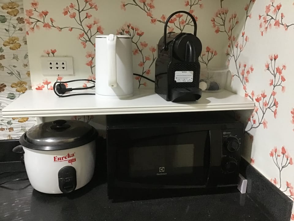 Microwave, Nespresso Machine, Kettle & rice cooker in the kitchen 