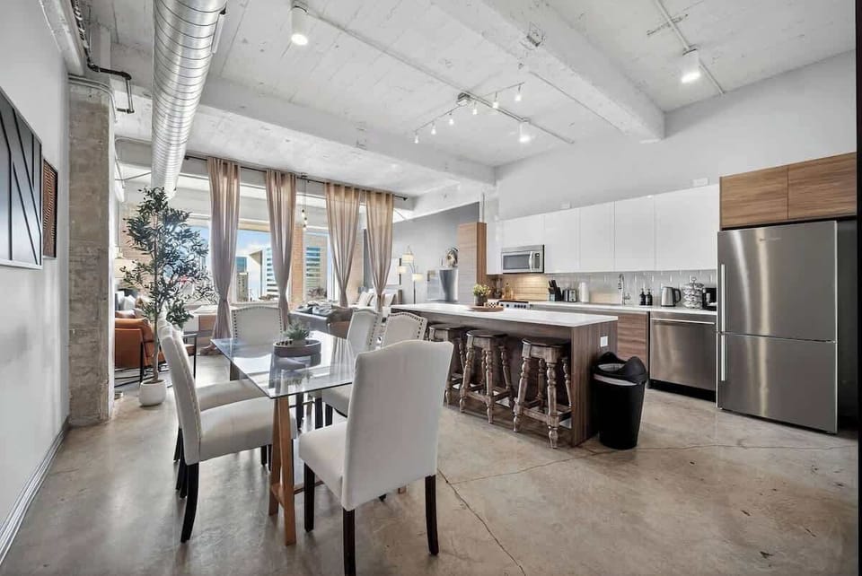 From morning strategy sessions to celebration dinners - dining area flows seamlessly between cooking and gathering.