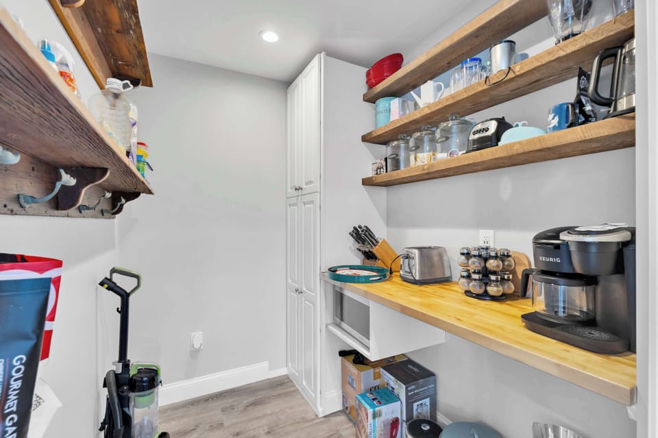 A walk-in pantry provides lot's of storage with everything you'll need for your stay.