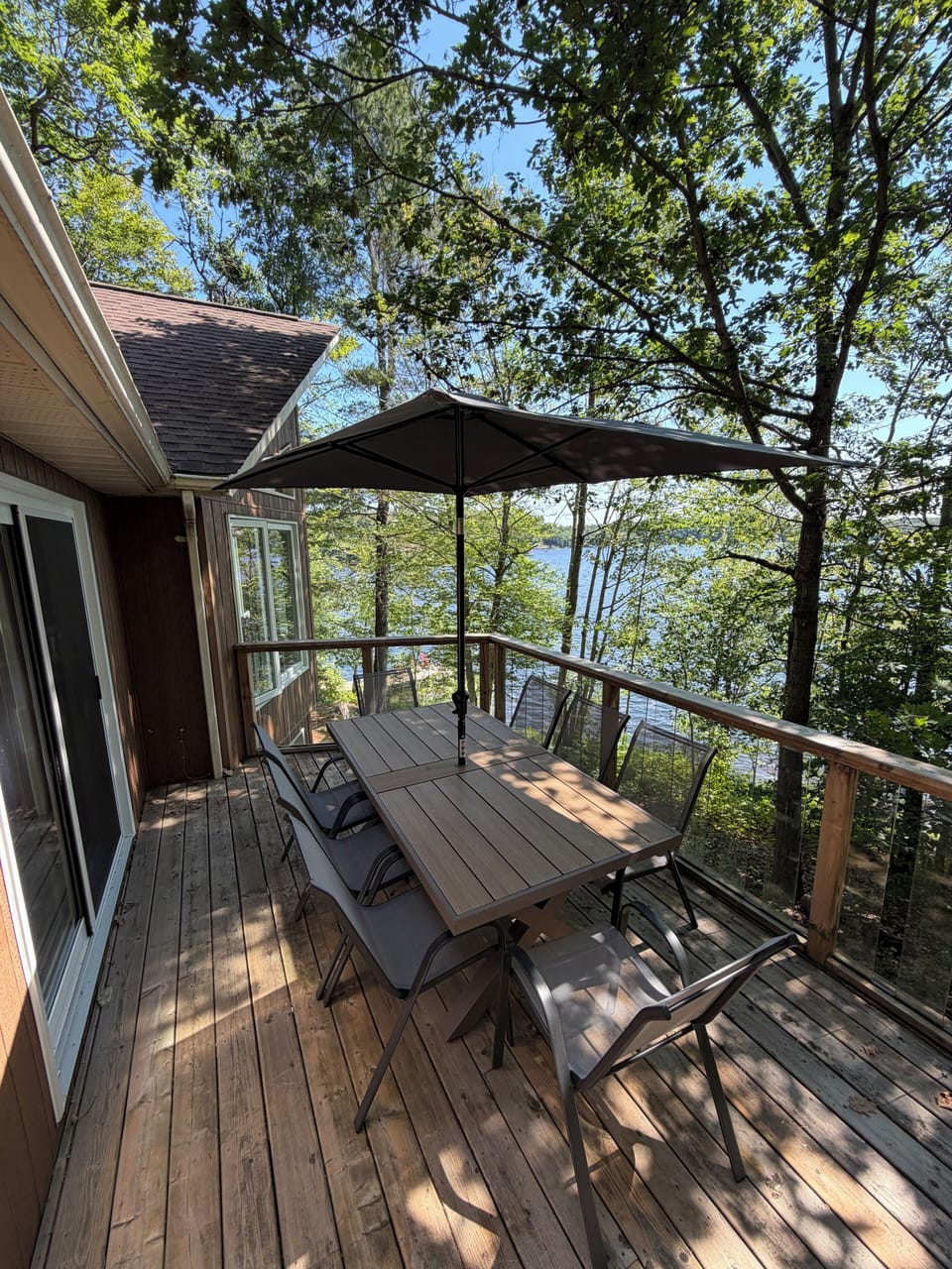 Outdoor dining on the deck overlooking Bass Lake.