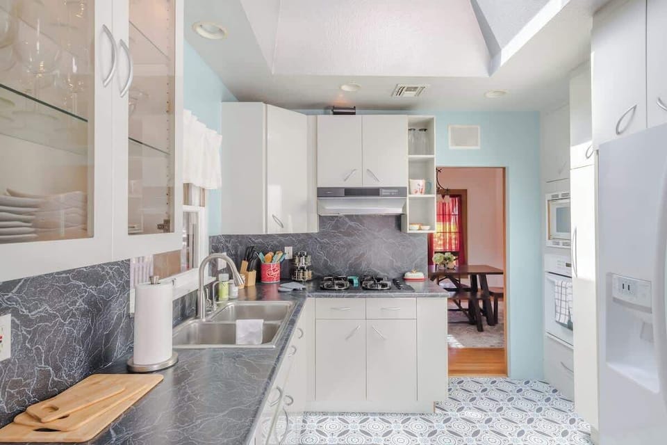 Large kitchen with full sized appliances.