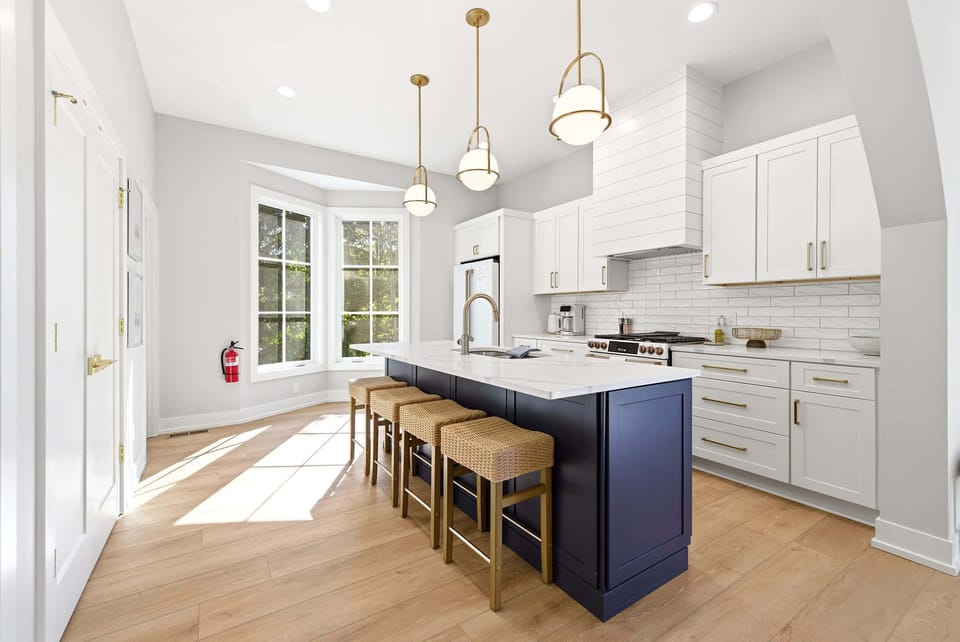Large island creates room for cooking, dining, and connection.