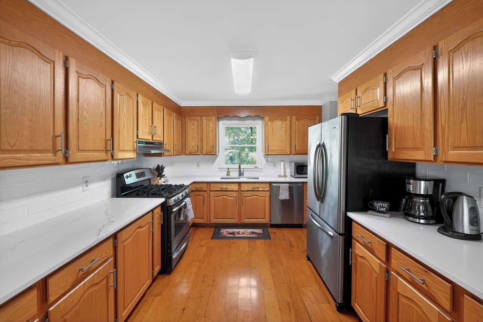 A fully equipped kitchen designed for easy cooking, shared meals, and group gatherings.