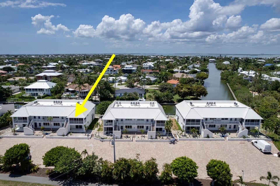 Location of Sanibel Arms A8, directly across from the beach and on a direct access canal