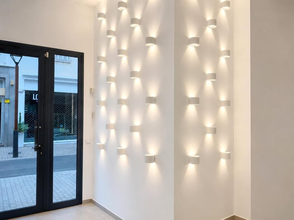 A modern and elegant entrance lobby with warm lighting and stylish wooden decor.