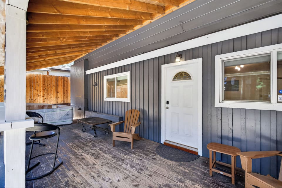 Take in the fresh mountain air from the stunning wrap-around covered deck. Featuring a beautiful cedar ceiling and comfortable Adirondack chairs, this protected outdoor space is perfect for enjoying your morning coffee rain or shine.