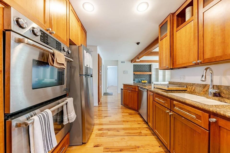 Everything you need for meal prep, cooking, and gathering in one inviting space.
