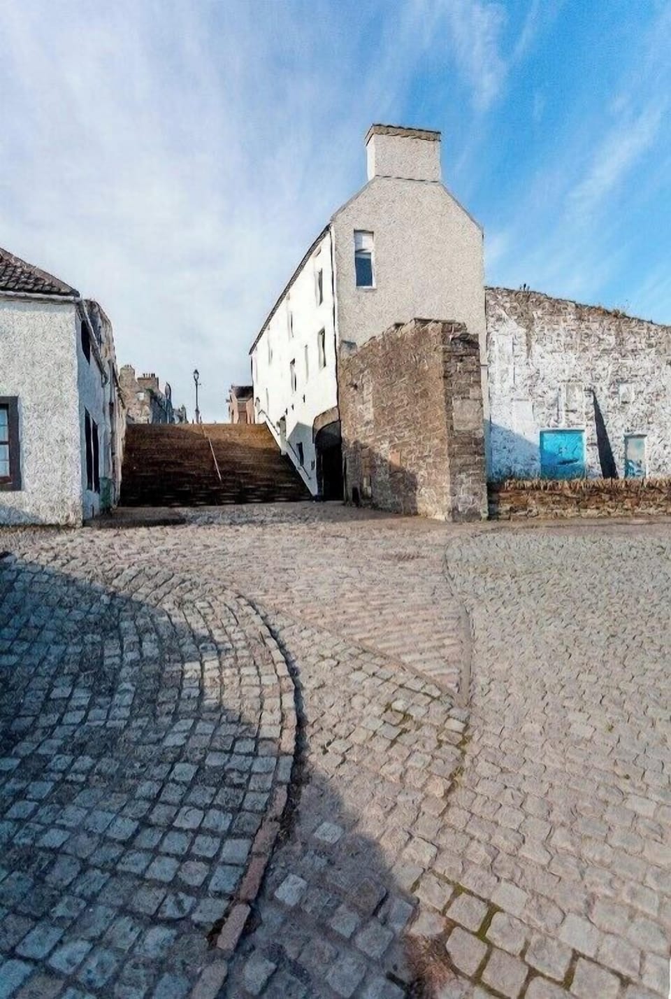 L.S. Lowry painted this very street in 1936 — marked in stone at your door