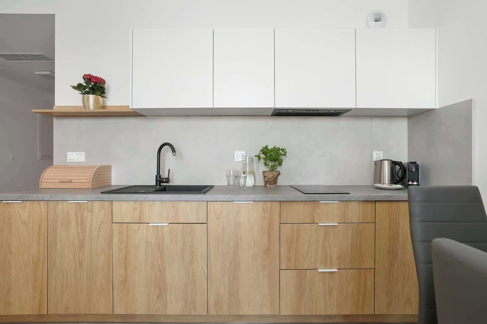 Functional kitchen with quality appliances and generous workspace for meal preparation.