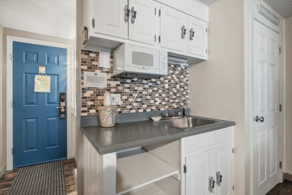Keep snacks & drinks tucked away in the cozy kitchenette space​