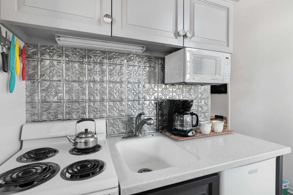 Perfect-sized kitchen for 2-4 guests stocked with everything you need to make meals or enjoy your morning coffee 