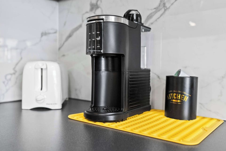Compact & convenient coffee station w/ a Keurig & extra counter space to start your mornings right.
