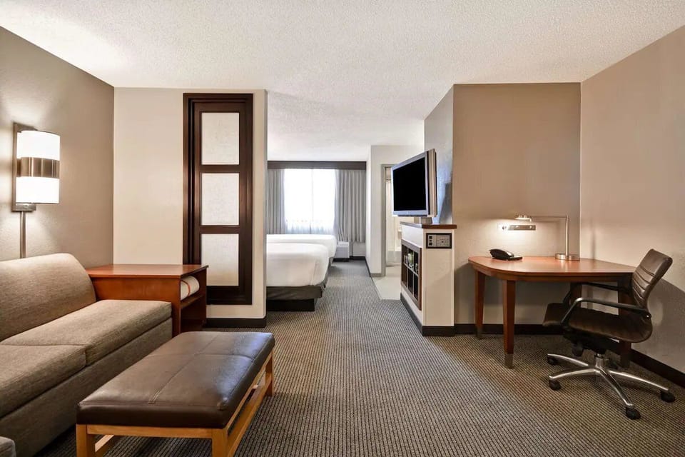 Bedroom, workspace and living area views.