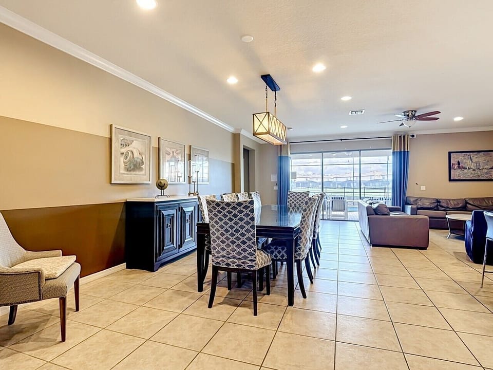 Elegant dining area with seating for the whole group, conveniently located beside the kitchen and living room.